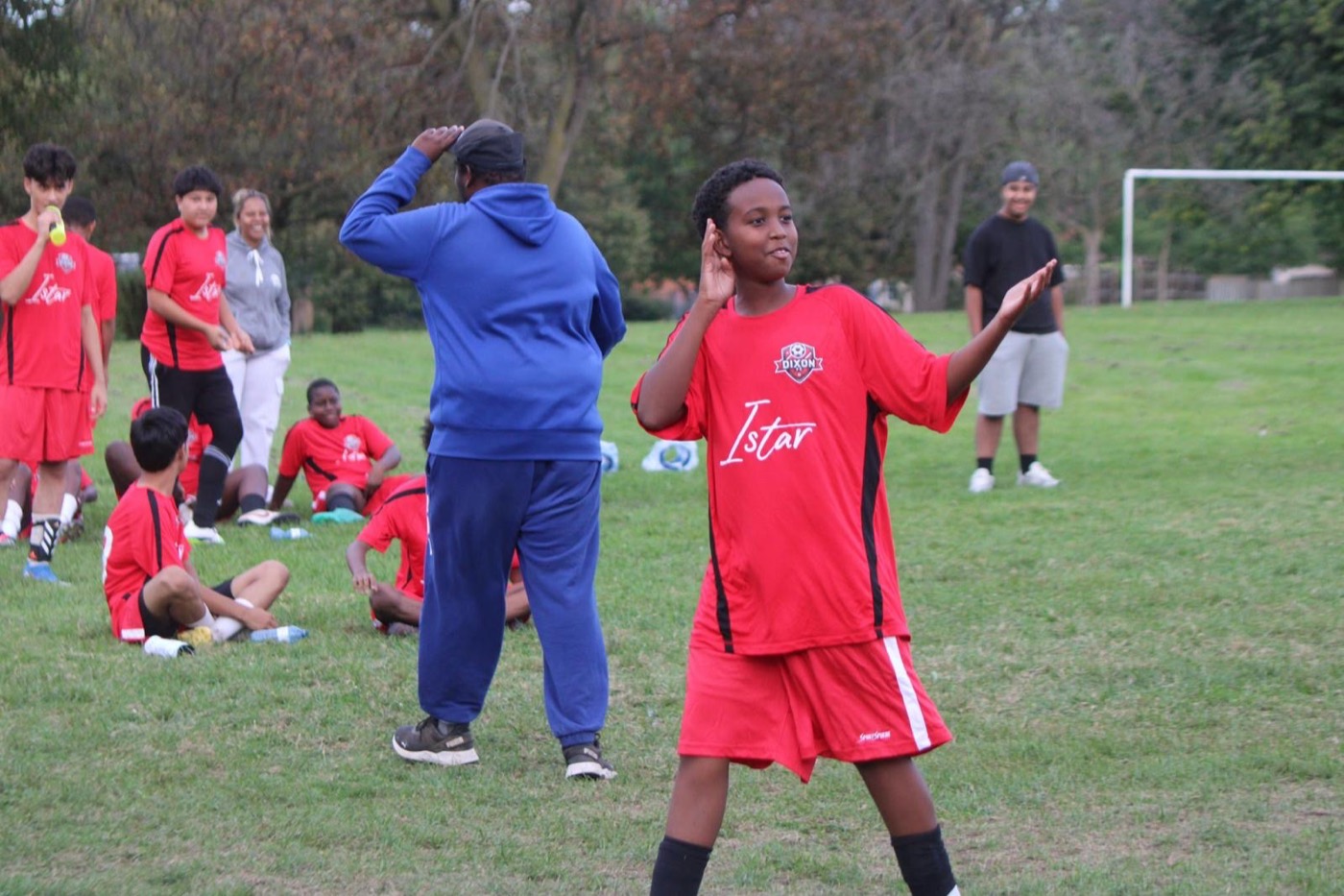 A Dixon FC player celebrates a goal